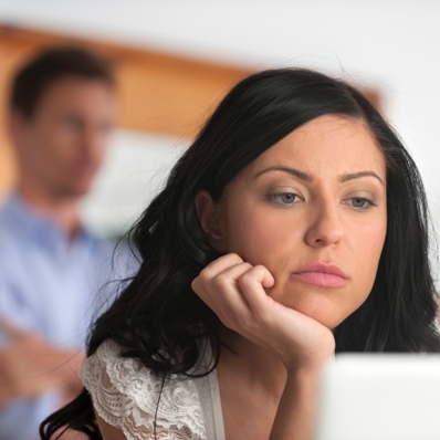 upset woman on computer