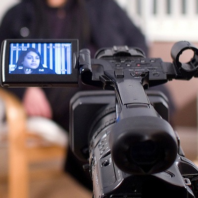 woman being interviewed on camera