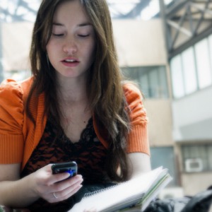 girl texting on phone