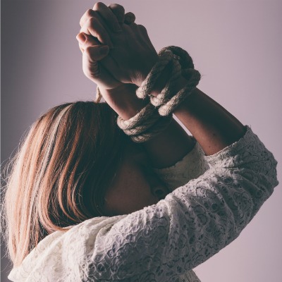 girl with hands tied up