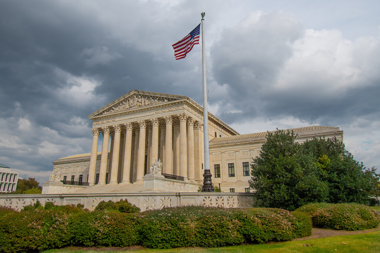 United States Supreme Court building on a cloudy day.