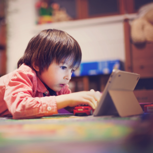 young boy on tablet