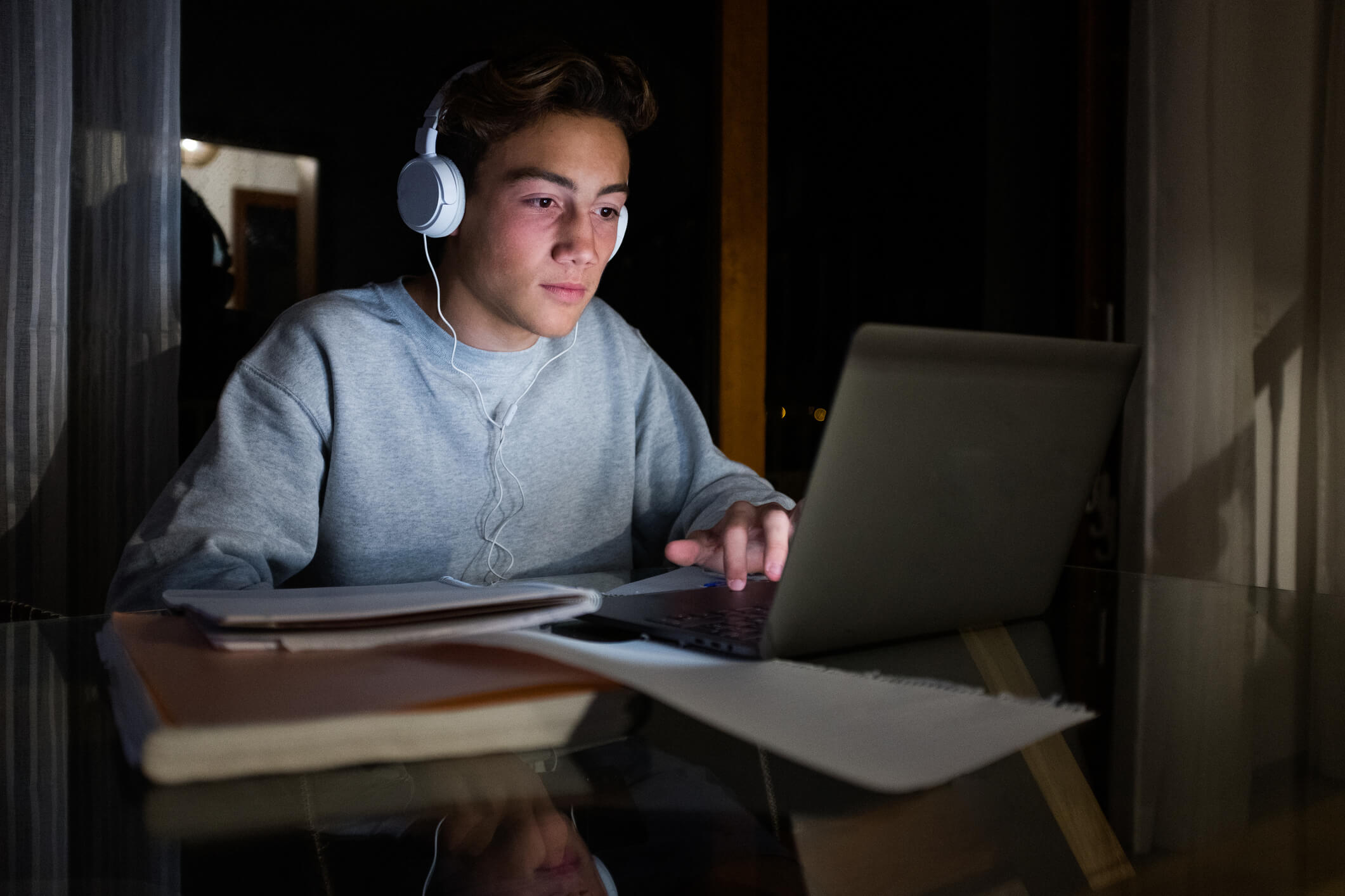 a teenager using a computer