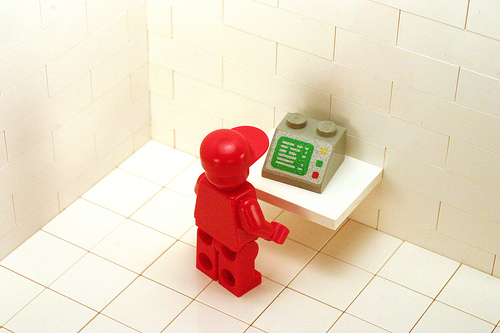 lego man with computer
