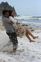 couple playing at beach