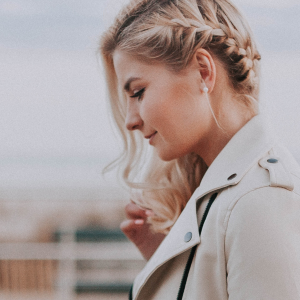 woman looking down outside