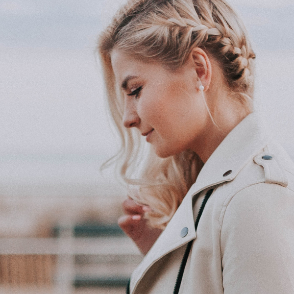 woman looking down outside