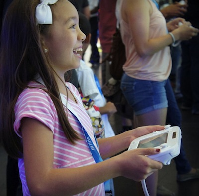 girl on a gaming device