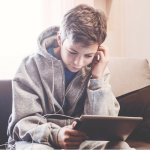 middle school boy on computer