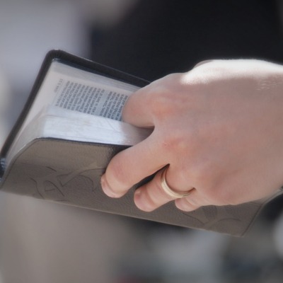 man with bible in hand