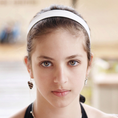 young girl with serious face