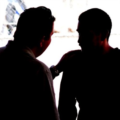 two men talking