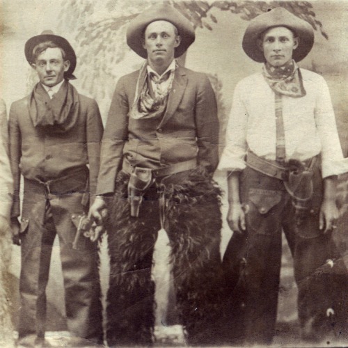 three men in western clothes