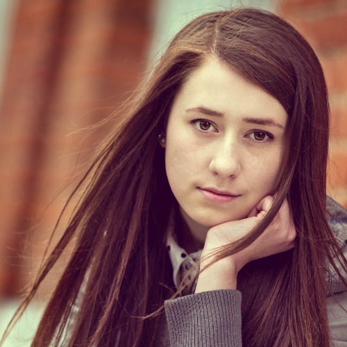 pensive girl alone outside