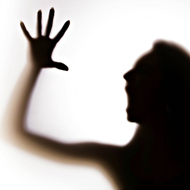 silhouette of a trapped woman