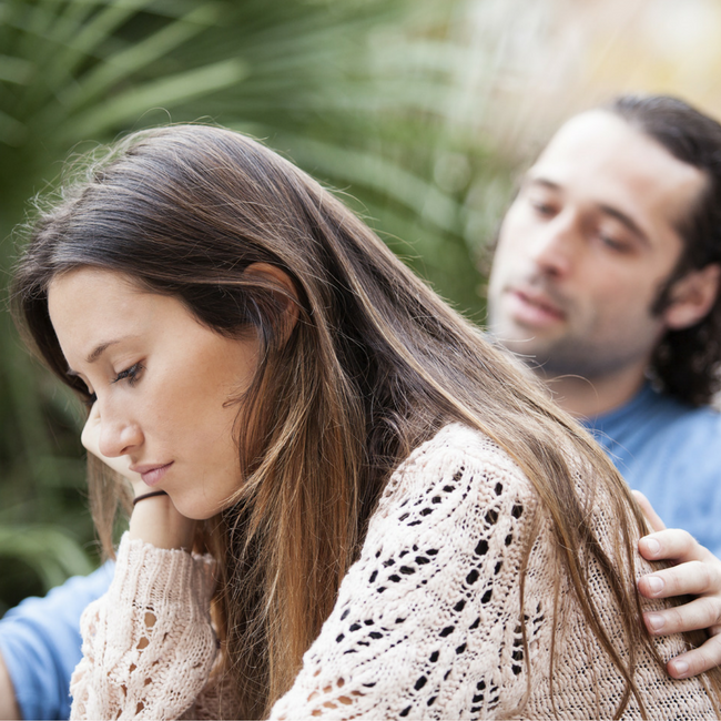 husband comforting wife