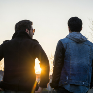 two guys talking outside