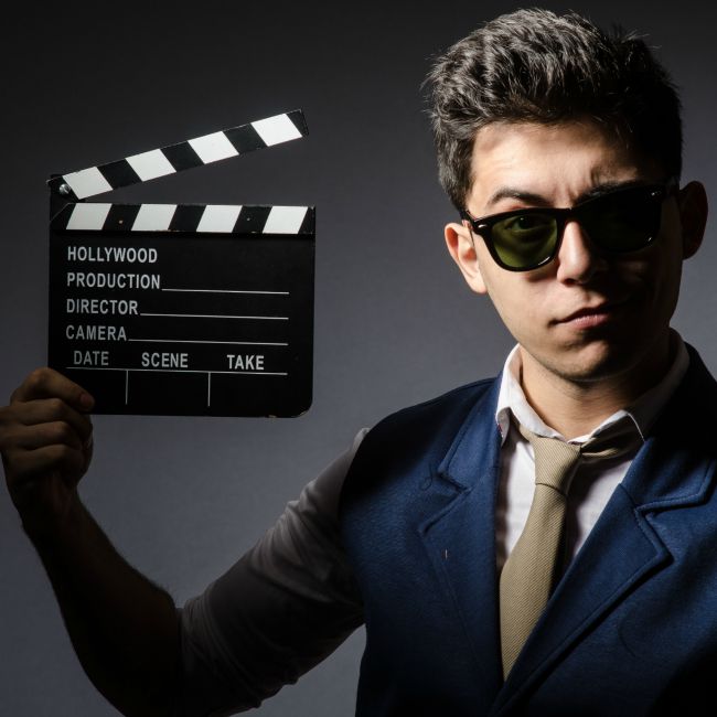 man with sunglasses on movie set