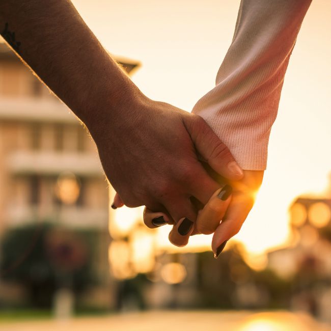 couple holding hands