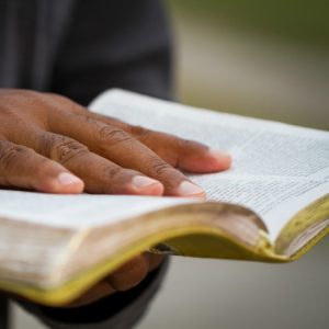 man with open bible