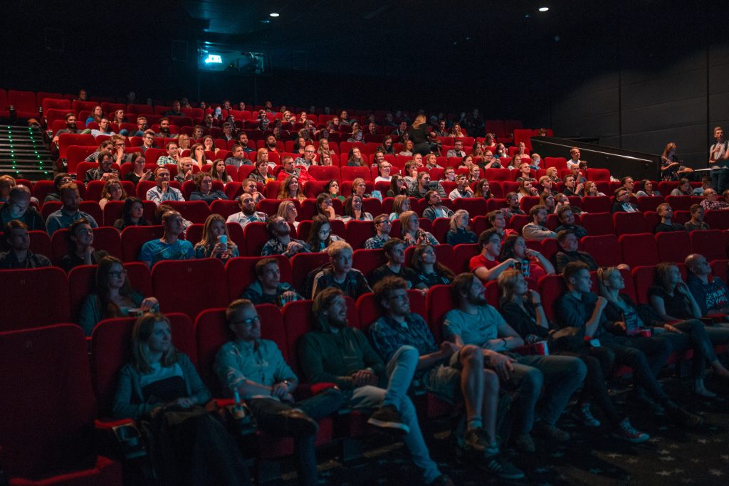 people sitting in movie theater