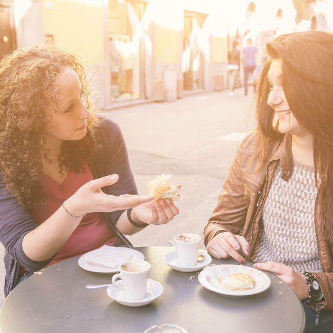 two women talking together