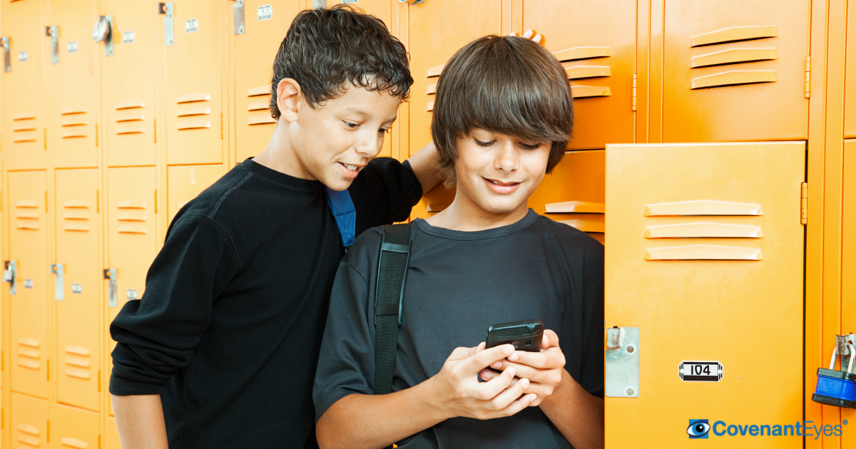 boys on phone during school