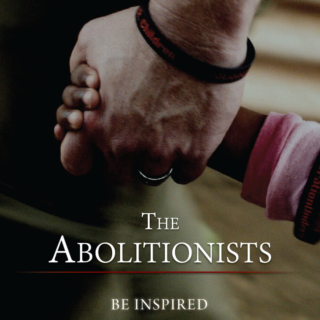 the abolitionists - woman's hand holding young child