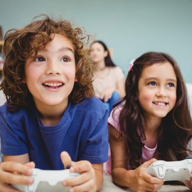 two kids playing xbox