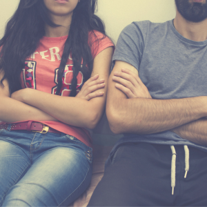 couple with folded arms