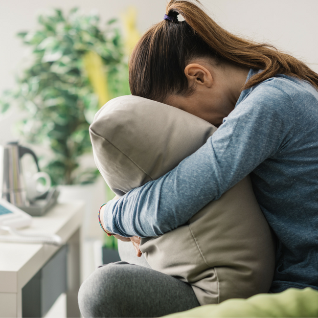 upset girl on couch