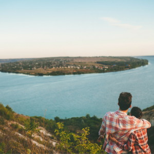 couple looking out over water