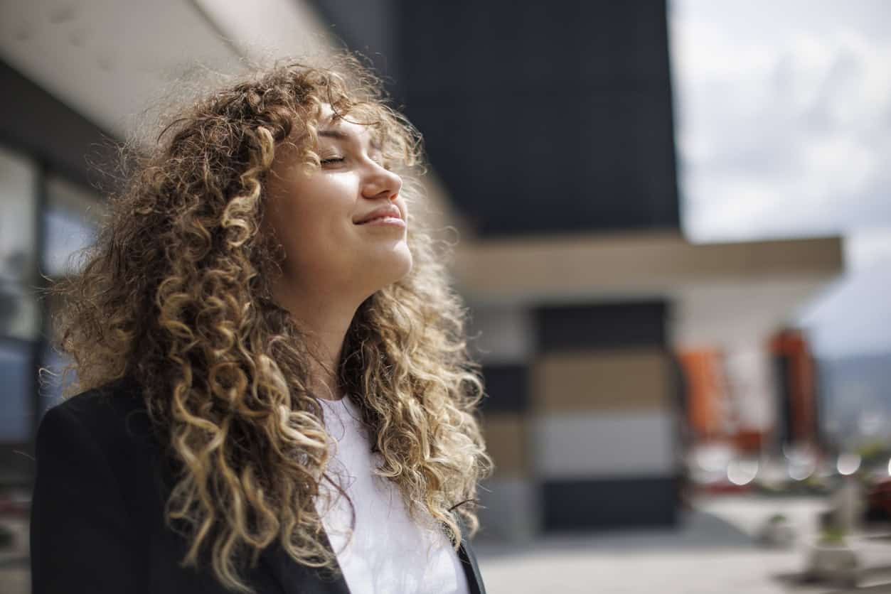 A young woman relaxing outdoors