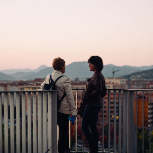 two women talking outside