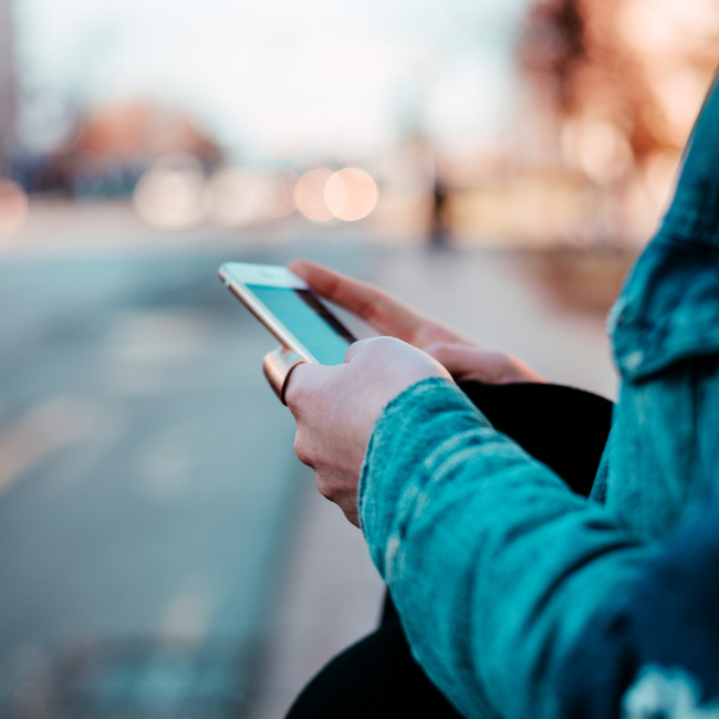 girl using mobile device