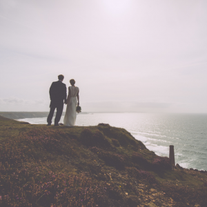 married couple overlooking cliff