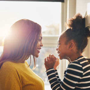 happy mom and daughter talking