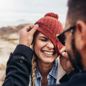 woman smiling with beanie hat