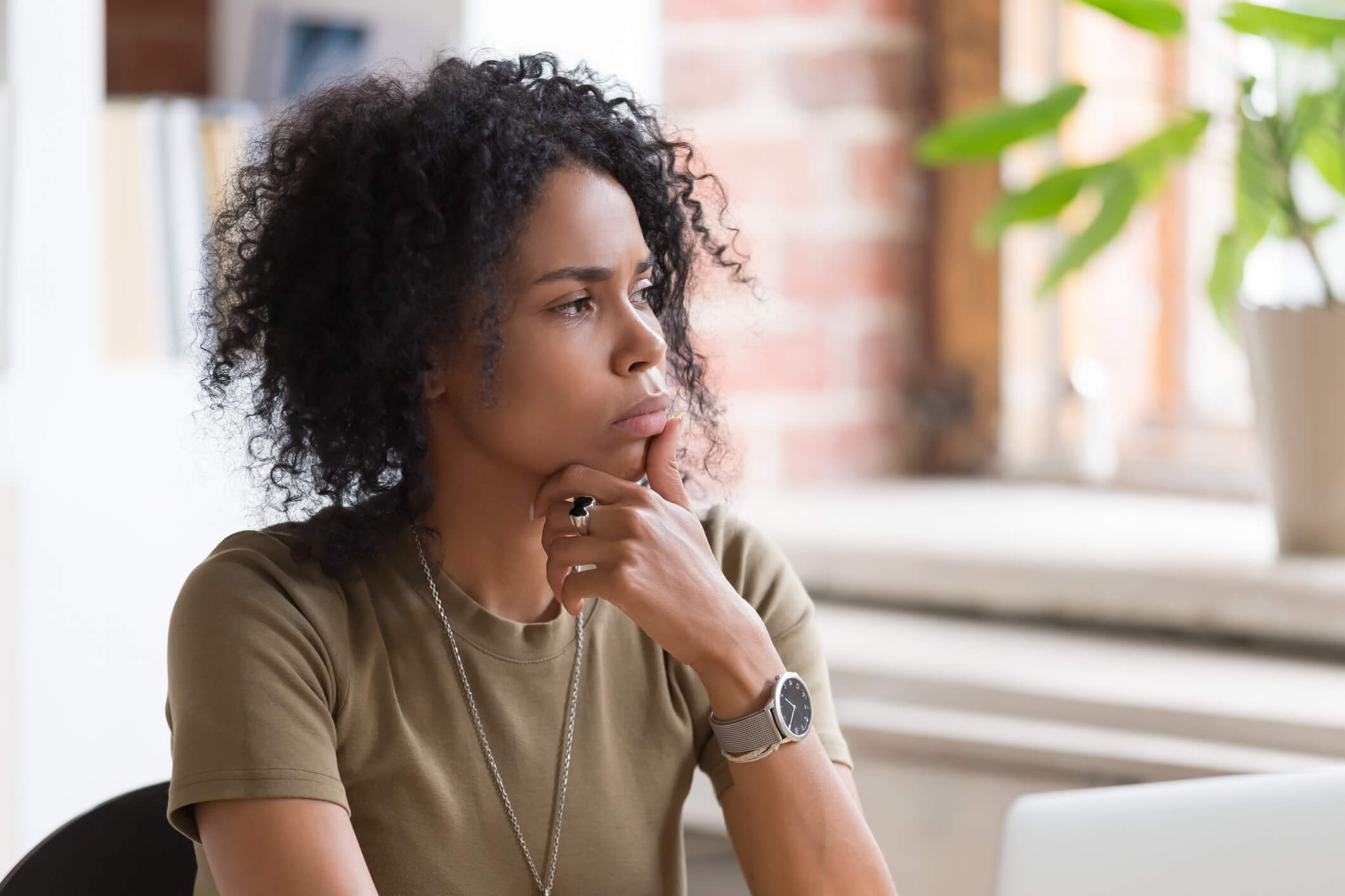 A young woman thinking about how to overcome porn.