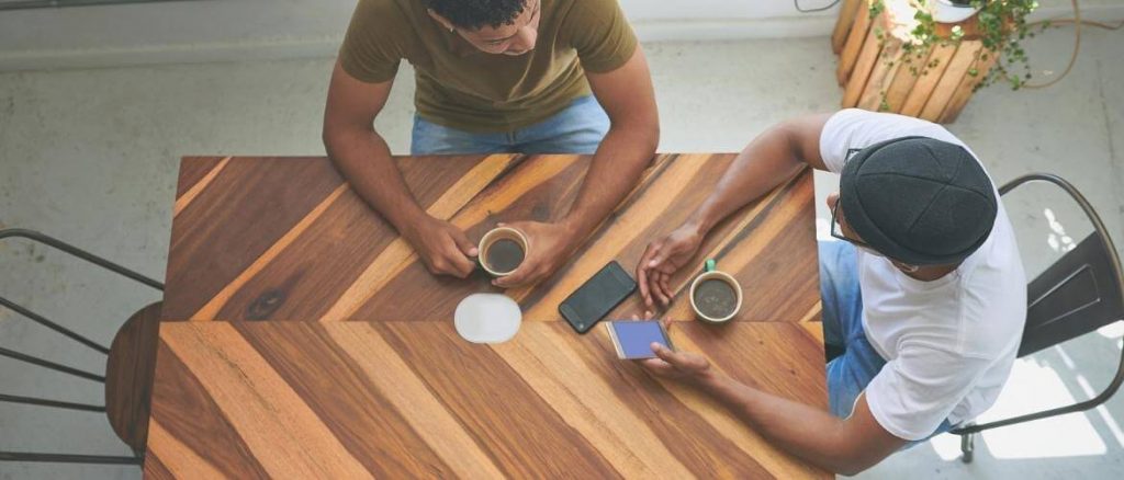 Accountable friends having coffee together.