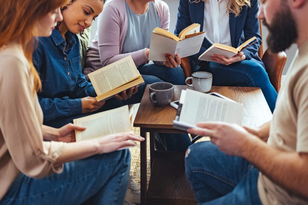 A group of young people in a book club.