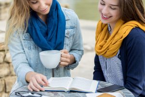 Two women having a Bible study.
