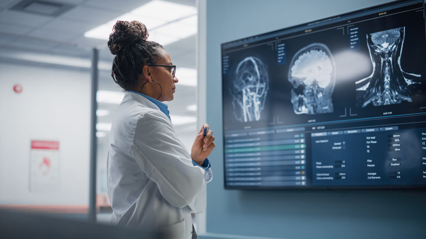 Scientist looking at a brain scan for dopamine.