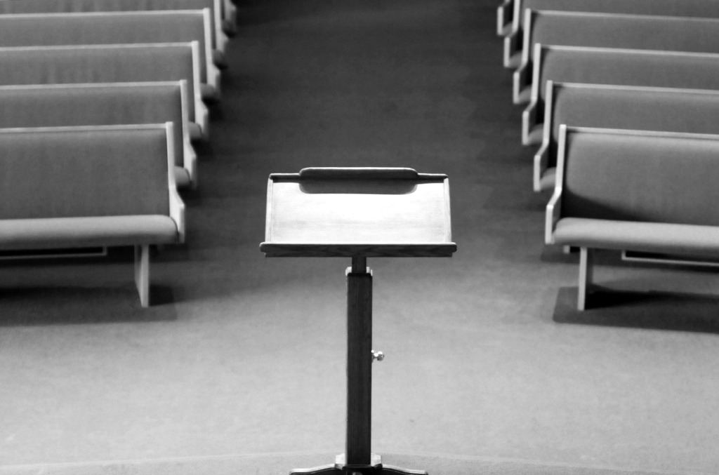 Black and white photo of an empty podium.