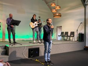 A youth pastor speaking to a group.