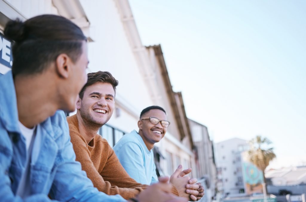 A young man with his friends.