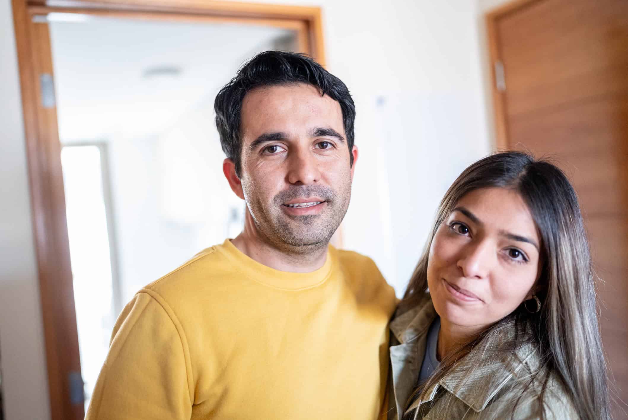 Portrait of a mid adult couple at home