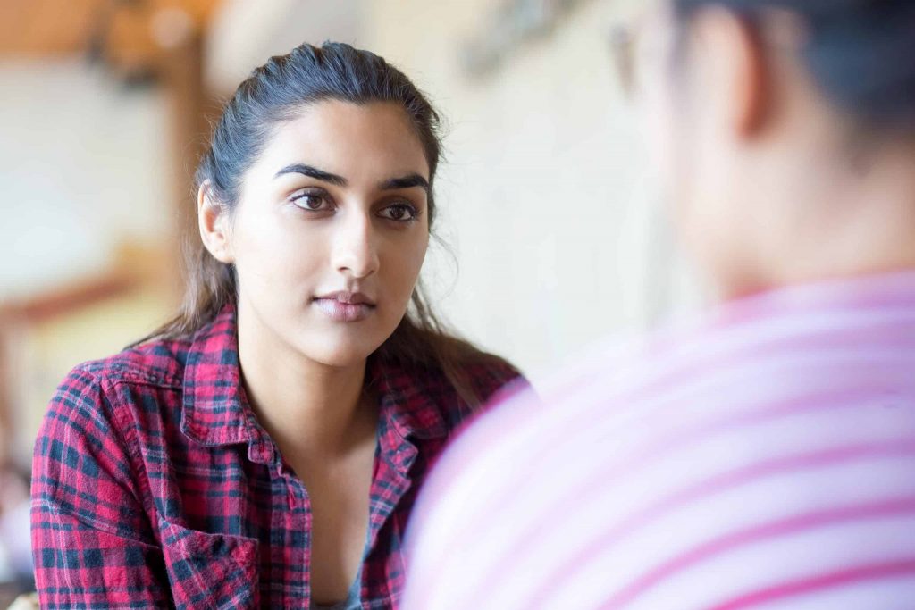 A woman asks how she can support her friend.
