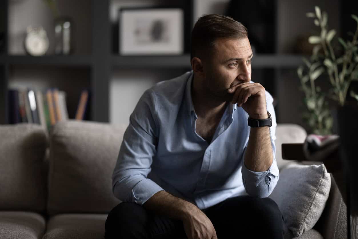 Pensive man lost in thought.