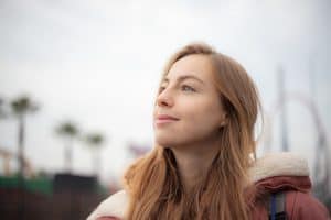 A young woman outdoors.